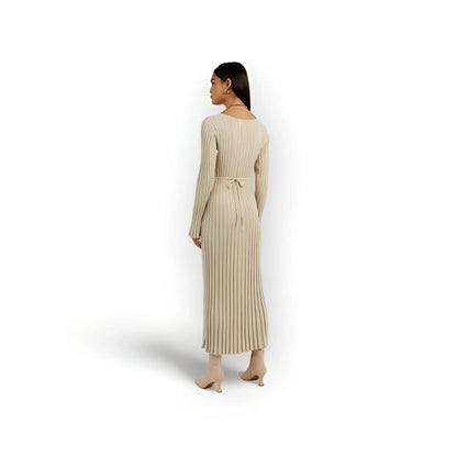 This Modest Soft Knit Maxi Dress offers unparalleled comfort and sophistication. Made with soft, breathable fabric, this dress is designed to provide ultimate comfort without compromising style. The flattering wrap design elevates your look effortlessly, making it perfect for any occasion. Experience the perfect combination of comfort and elegance with this dress.